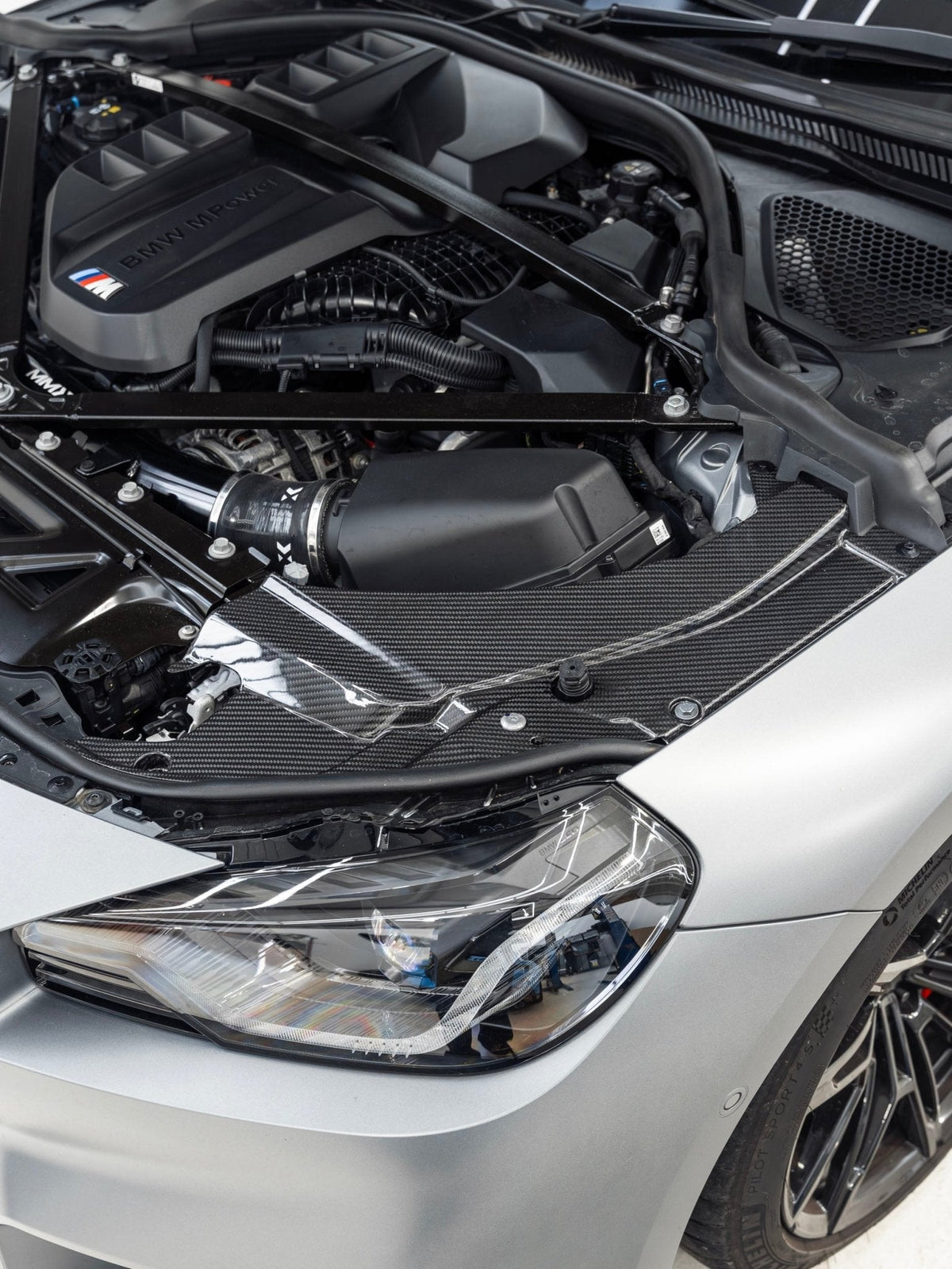 BMW M2 G87 Pre-Preg Carbon Fibre Engine Bay Headlight Cover by FORM (2023+) - Evolve Automotive